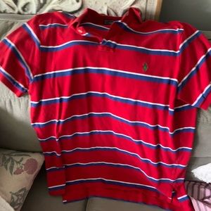 Red Blue and White polo with green Logo